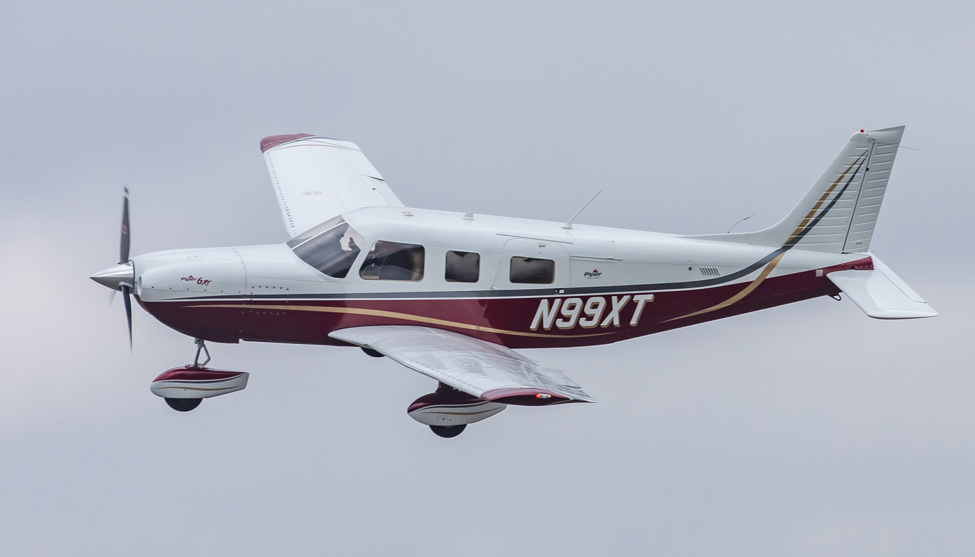 2004 Piper Saratoga 6XT in the air